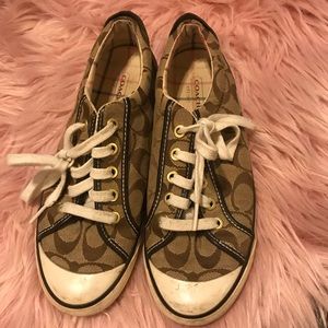 Ladies brown monogram Coach tennis shoes
